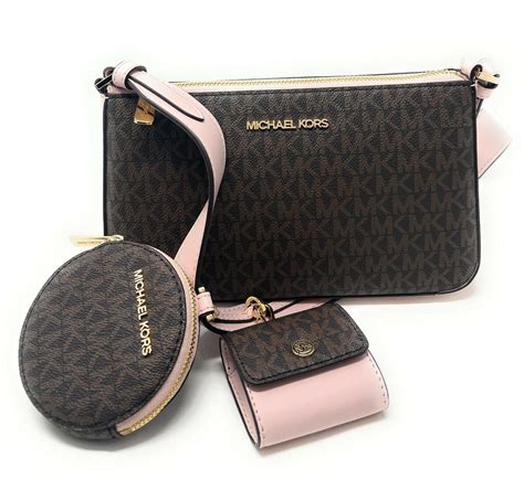 michael kors crossbody with tech attached mk signature|michael kors crossbody small.